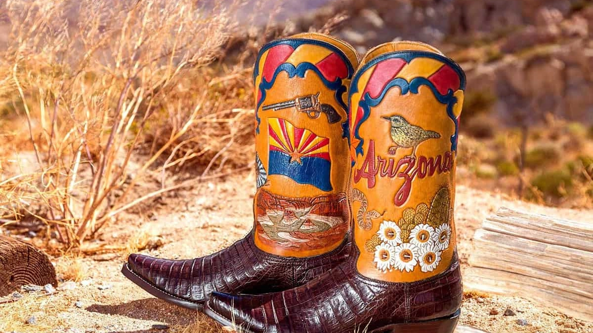 Vintage boots with some really cool designs on them. Artistic Upcycling of Old Work Boots into  main image 2